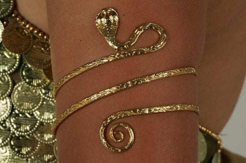 Brass Cobra Cuff 
representing the descent into sacred sexuality and the unconsious 